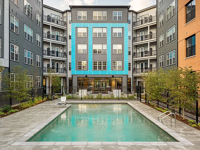 Select apartment homes feature balconies, some overlooking the pool