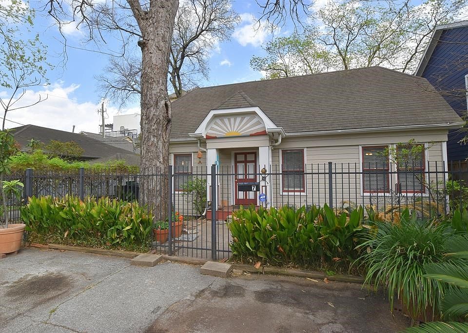 #7 Buell Court is located off Bomar Street in private 1920's courtyard development of known as Buell Court. This home and 6 other homes on the courtyard each own an undivided interest in the courtyard and driveway.