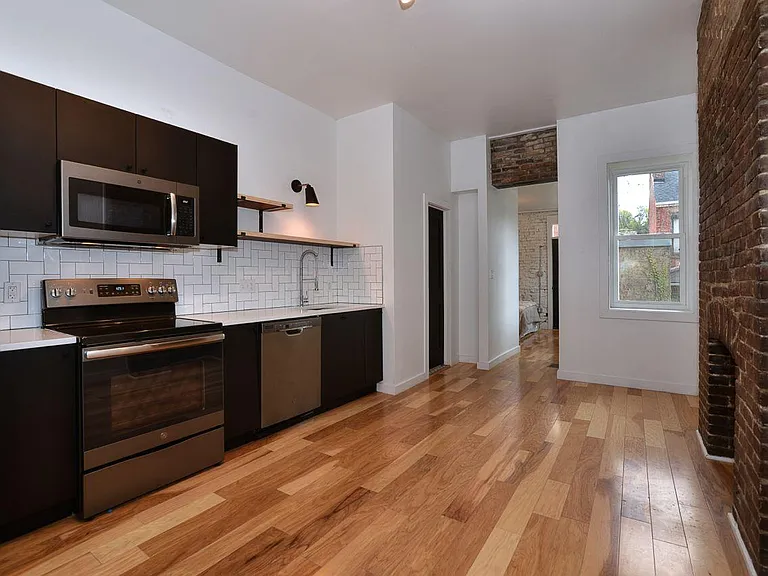 Sleek kitchen (butcher block island not shown)