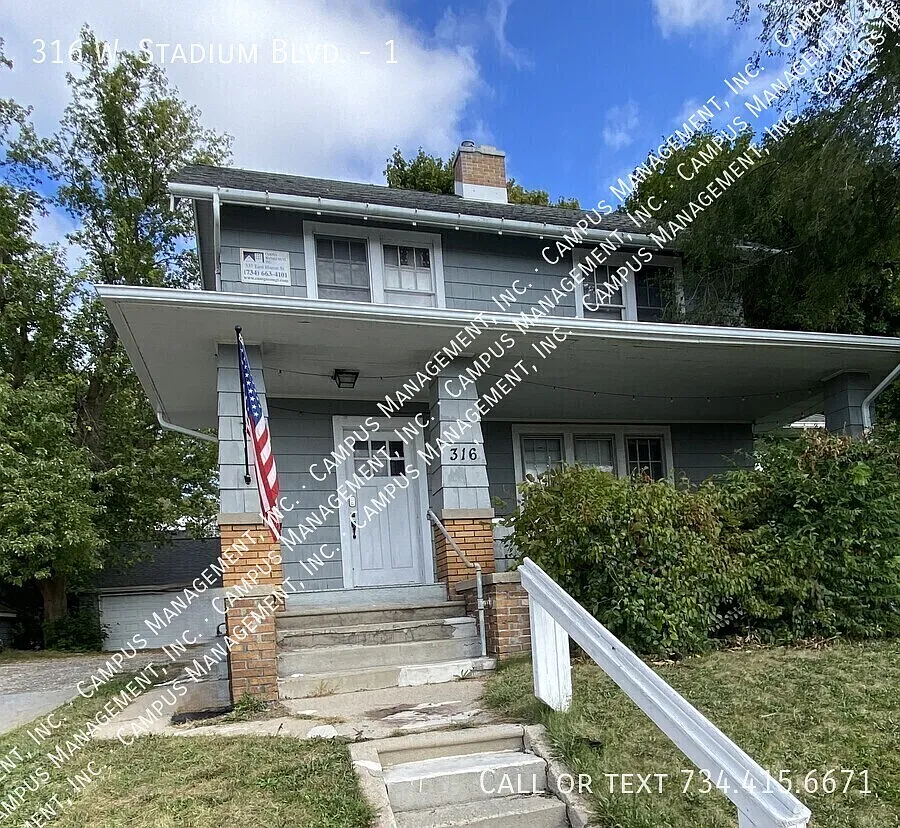 3 BR House - Half a block to the Big House! — Photo 1