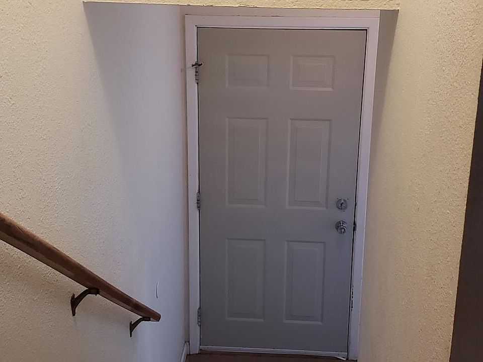 Stairway down to front door.