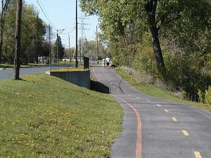 Great walk and bike trails - ACROSS the street. Go for miles. Go for a loop. Not unlike Lake Harriet, Calhoun or Bde Maka Ska.