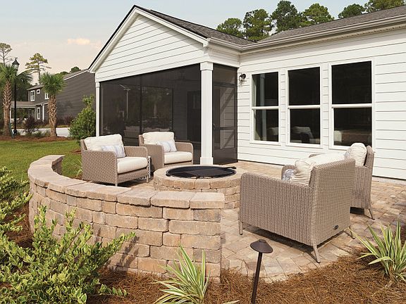 Spacious screened in porch and fire pit on the patio to gather and relax with friends.