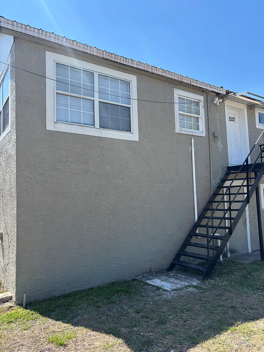 Outside View, Stairs shown leading up to the unit. - 2537 S Park Ave #2537