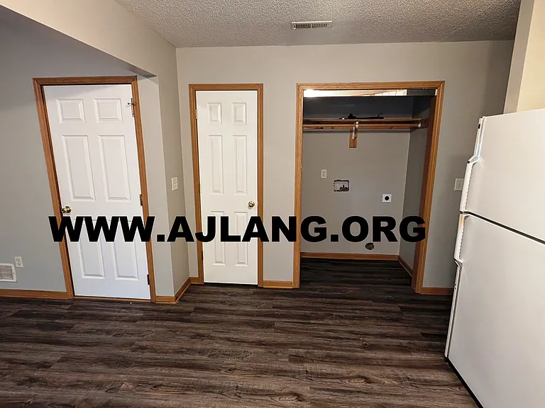 WASHER DRY HOOKUPS, COAT CLOSET, ENTRANCE TO GARAGE