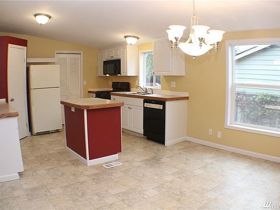 Open concept kitchen and dining area great for entertaining or making memories in the kitchen