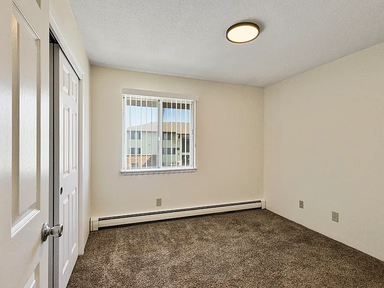 Bedroom with updated lighting