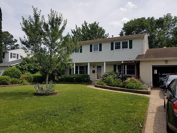 Front of House from Street (Driveway)