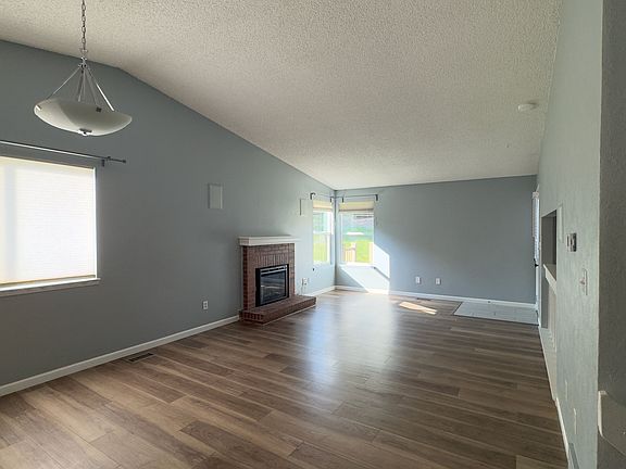Living and Dining room, with Fireplace.