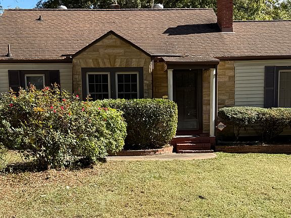 Coming up Roses out front.