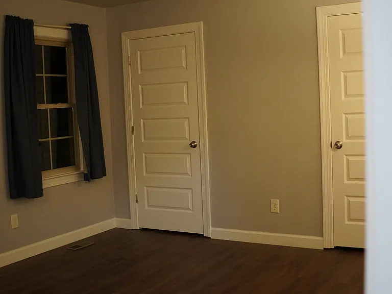 Master Bedroom, new doors & trim throughout entire house.