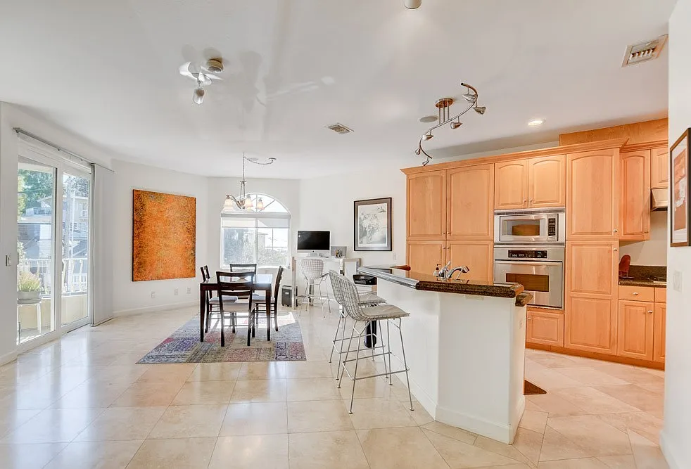 Harbor views! Double attached Garage with EV charging outlet! Balconies! Central AC! In Unit Wash... — Photo 1