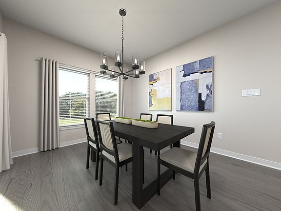 The open-concept floorplan allows for an easy flow between the kitchen and dining areas.