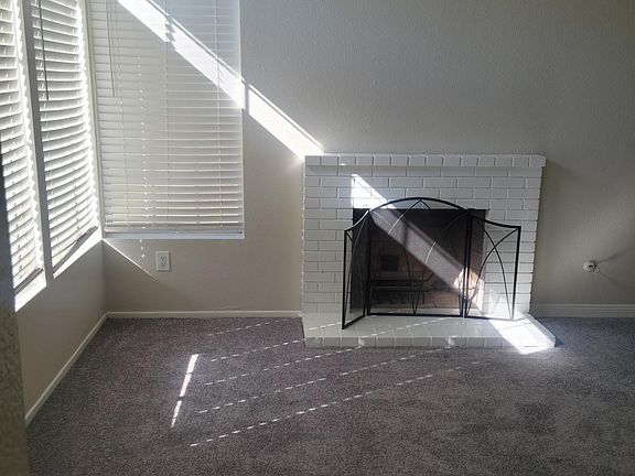Formal living room with fire place