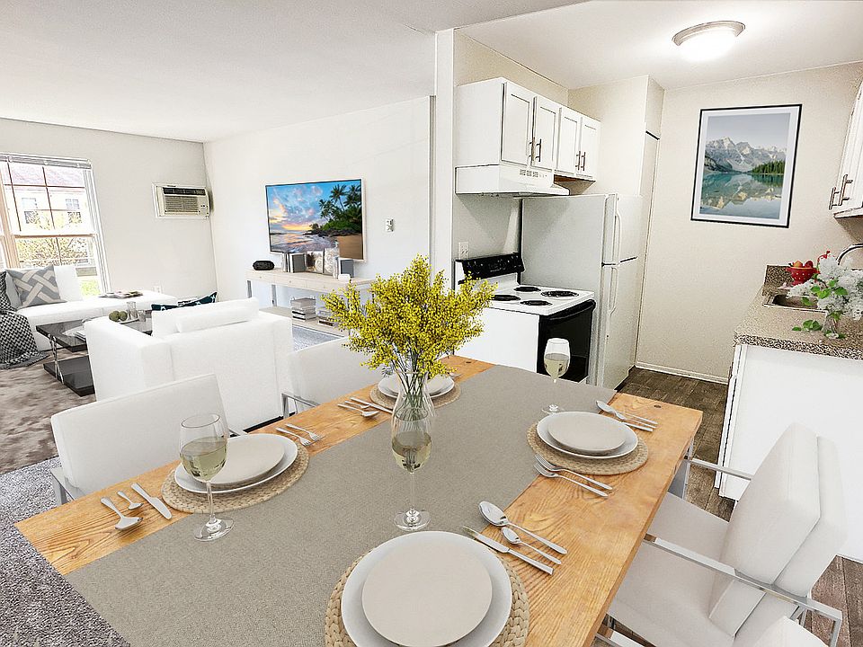 A full-featured kitchen with wood plank floors for easy care, a large living area with light-loving windows, a plush carpeted bedroom, and a location that puts Kensington Park nearly in your backyard.
