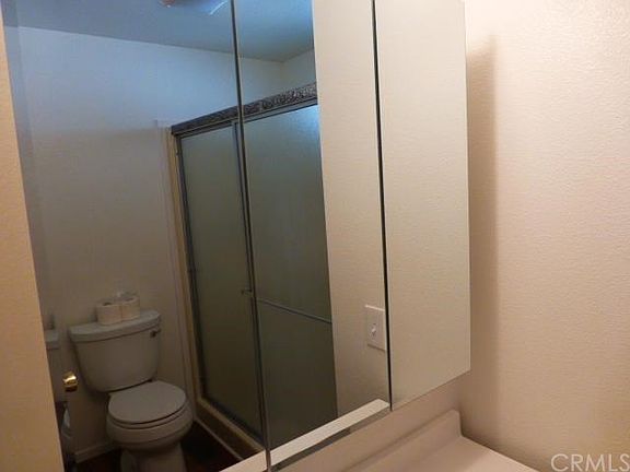 Bath 2 New cabinet, toilet, paint, flooring, new medicine cabinet