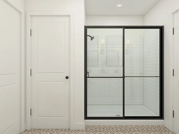 Primary bath with glass-shower enclosure