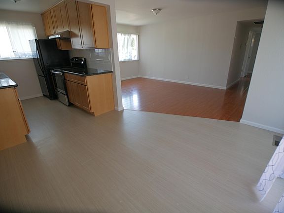 Kitchen, dining, and living areas