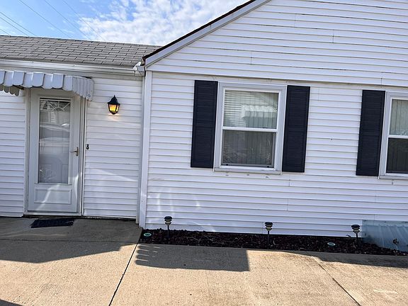 Side entrance from shared driveway.