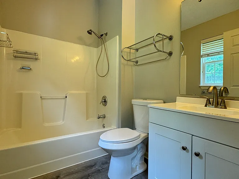 Master bathroom - newly refreshed with new floors, toilet and vanity