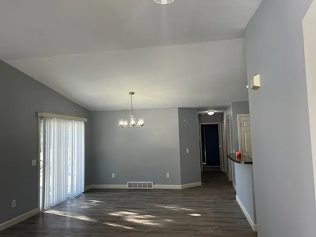 Main living room looking down the hallway to bedrooms