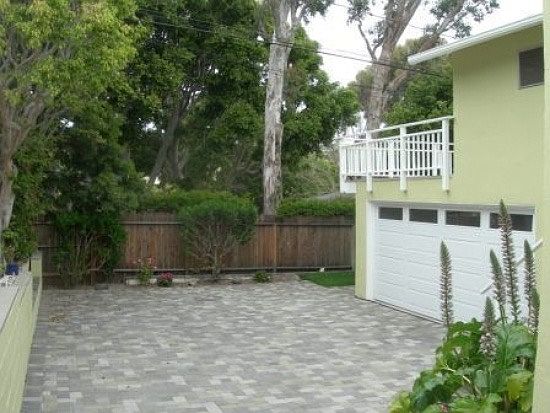 Enclosed paved Courtyard and 3 car garage