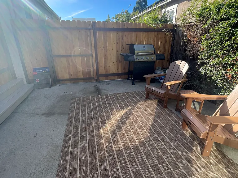 rearranged furniture now that the fire pit table is assembled