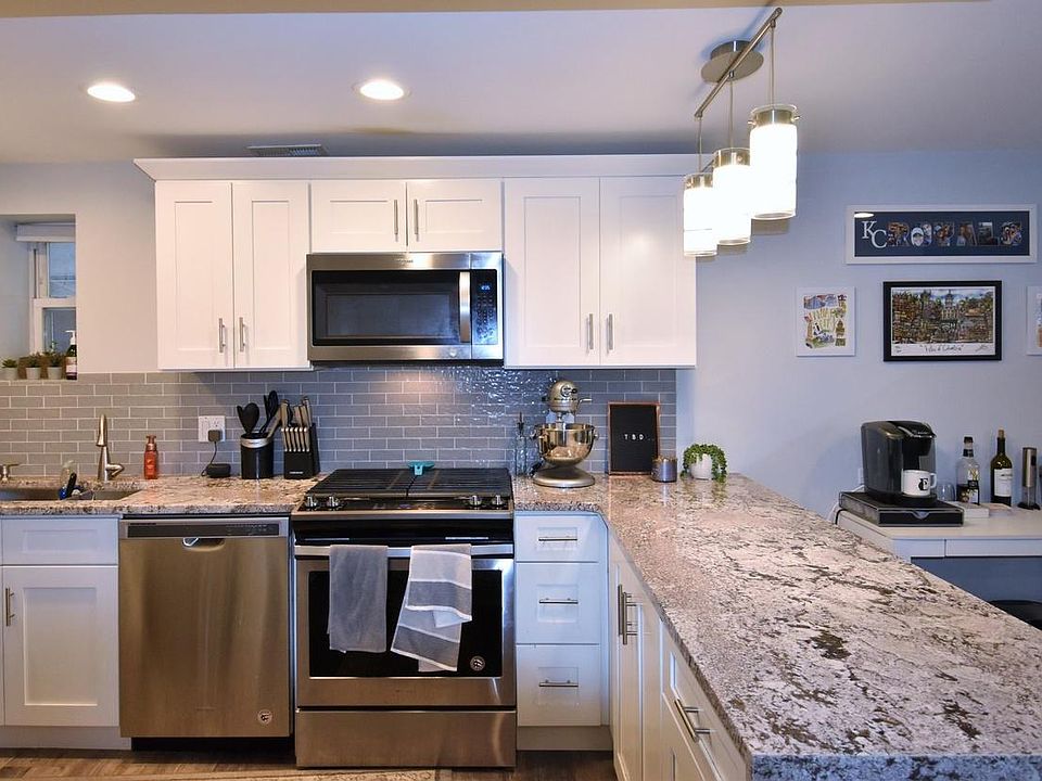 Updated, stainless steel appliances and dishwasher. Built-in microwave
