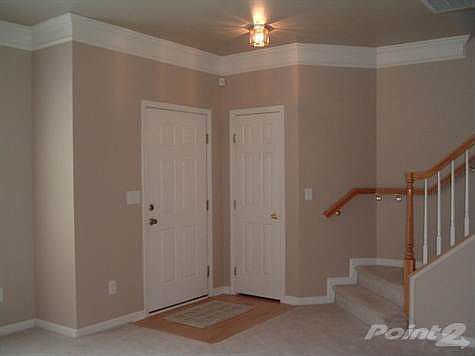 entry with staircase to upper level