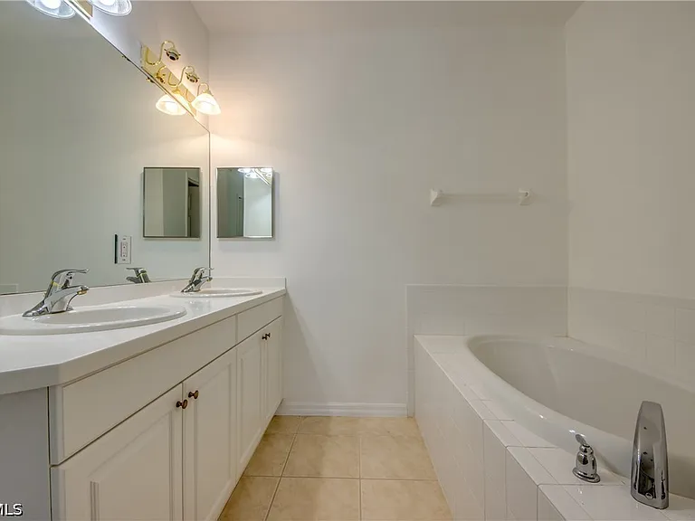 15250 Riverbend Blvd #204 — Photo 14