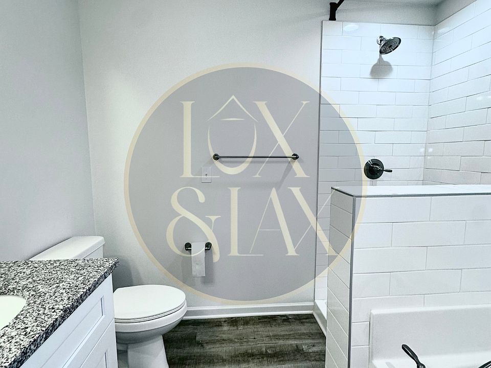 Bedroom 1 | Private Bath features: Double Sinks, Toilet, Stand Alone Shower w/ Large Tub