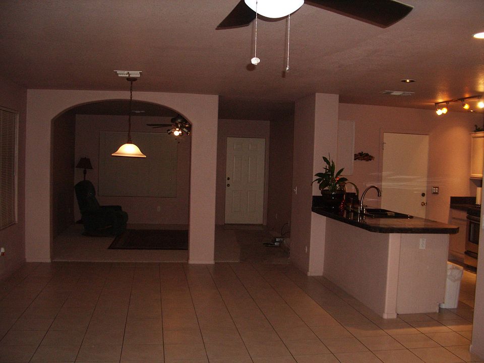 front room w/ part of kitchen