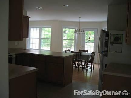 View of Kitchen from Side Door Entrance