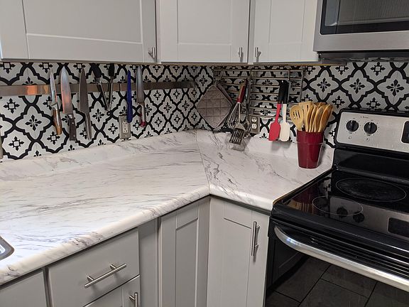 Wall mounted knife & utensils rack.