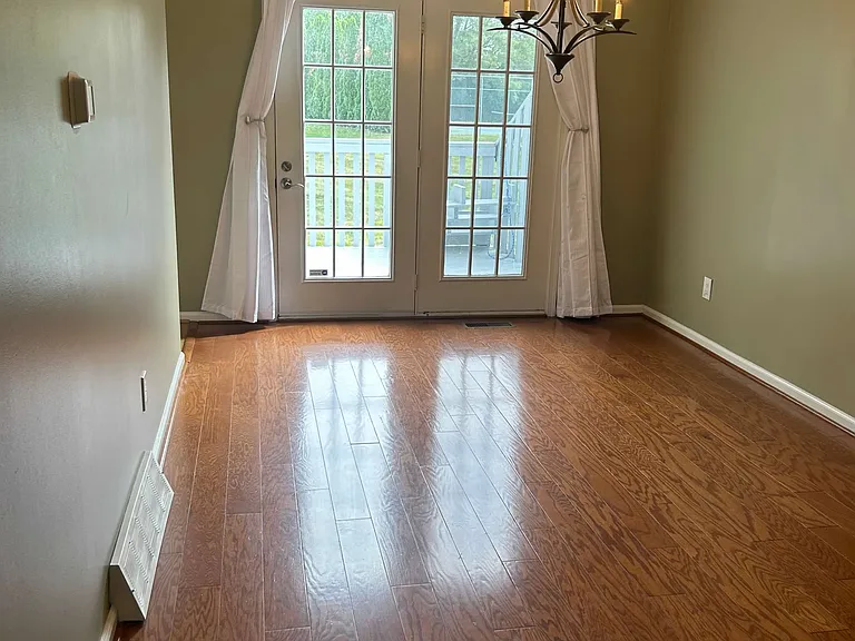 Formal dining room with access to large deck space for entertaining