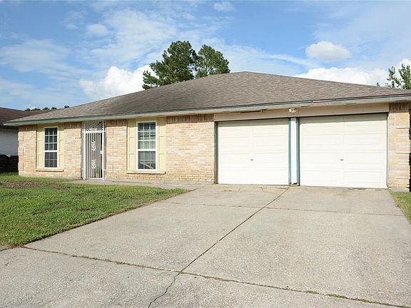 Cozy 3 bedroom 2 bath single story with 2 car garage.