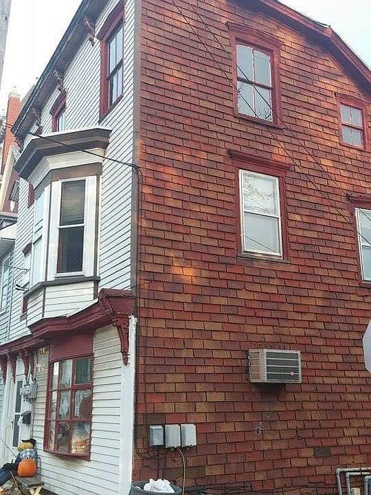 Outside of house. 2nd floor apartment for rent