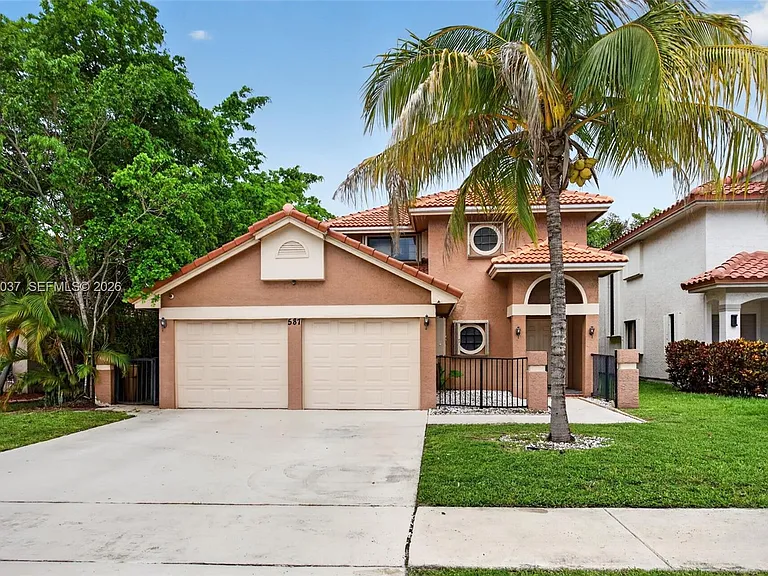 587 NW 38th Ave — Photo 1