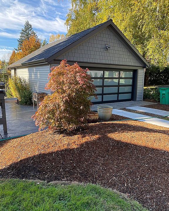 New garage door and siding. 