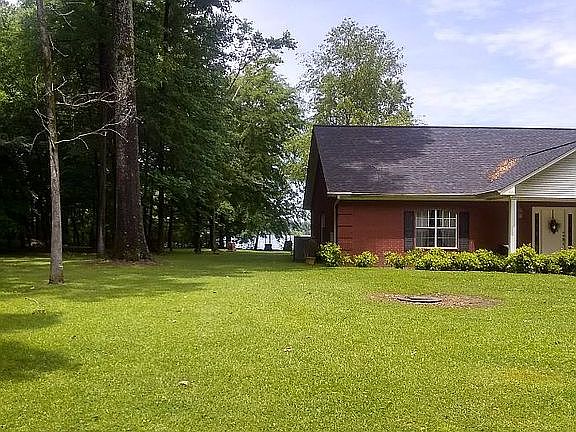 Front Left Side Brick Home 