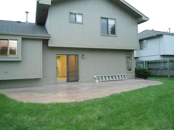 Large stained/stamped back patio