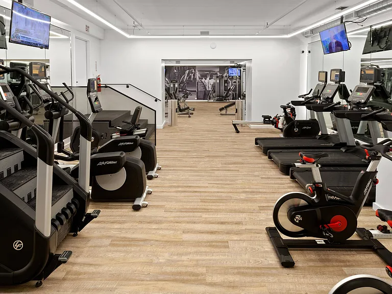 24-hour fitness center stair machine and treadmills