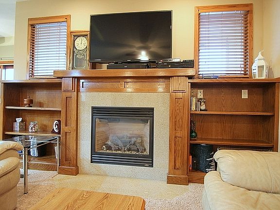 Fireplace Surrounded by Built-ins