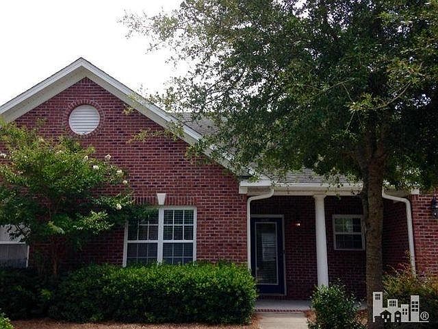All Brick Townhome with One Car Garage