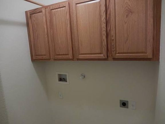 Washer/Dryer hookups and cabinets