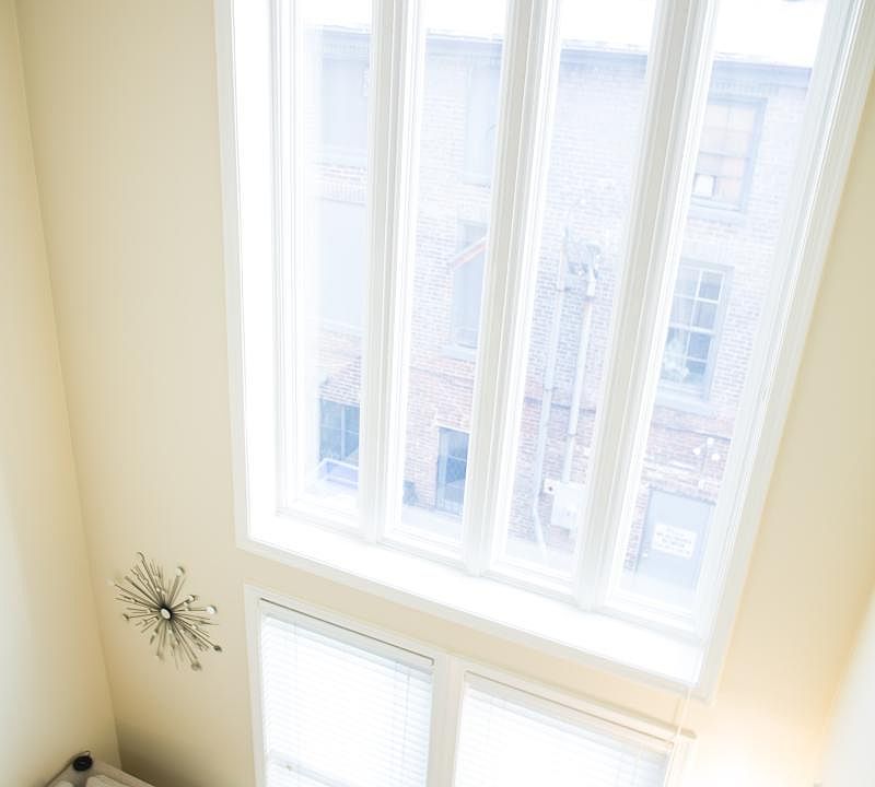 Furnished living room from bedroom balcony