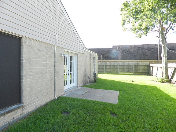 Large, fenced backyard and patio