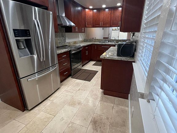 Remodeled Kitchen with Stainless Steel Appliances