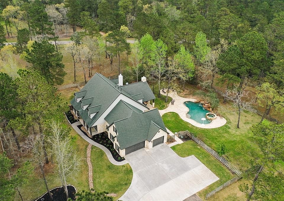 Approximately 5.09 acres Cross fenced for horses! 3 car Garage, Pool, Spa and Waterfalls plus separate firepit area and FABULOUS Outdoor Kitchen area! Water Well for irrigation and Pool!! Minimum 4 stall barn , but could have more. Plus Tack Room and