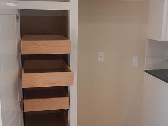 2nd cabinet pantry with roll out drawers